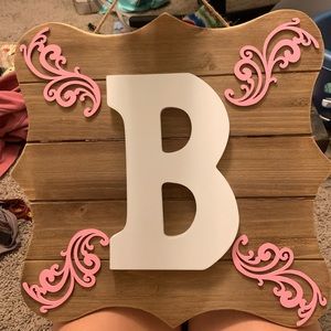 B monogram sign